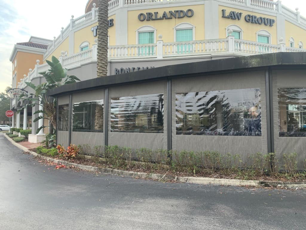 Clear Vinyl Enclosures on Commercial Building